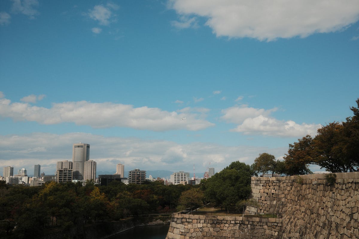 Osaka skyline with historic castle walls