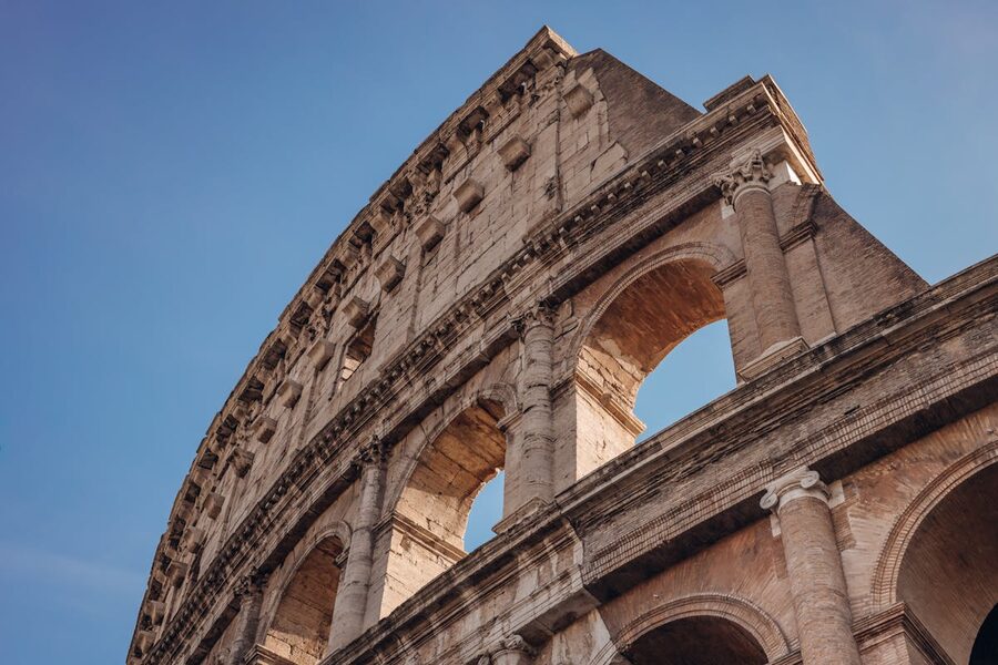 Colosseum in Rome under blue sky