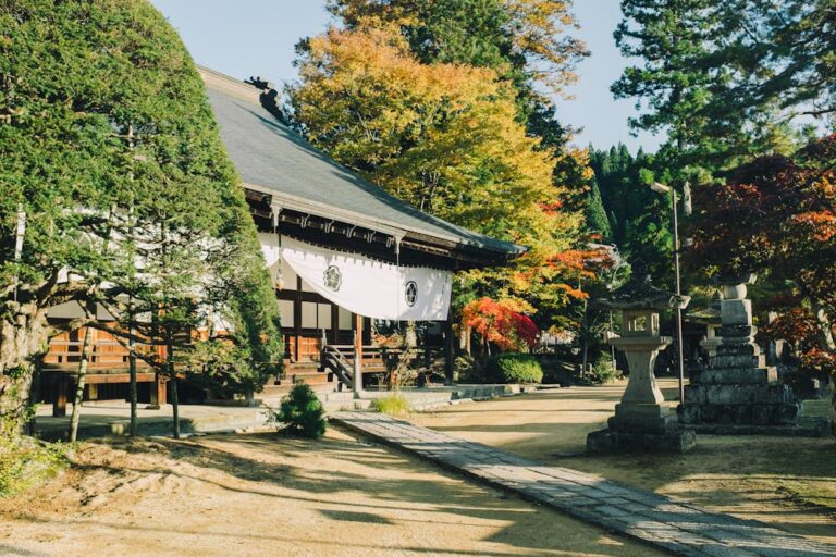 Buddhist temple with autumn colours in Takayama Japan