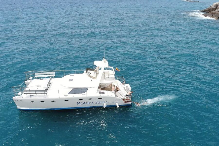 Tenerife: Marine-Life Tour with Transfer, Buffet and Drinks - Boarding the Monte Cristo Catamaran: comfort and group size