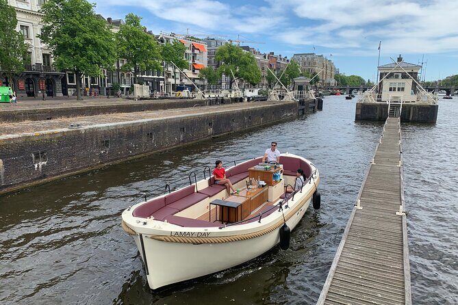 Guided Amsterdam Canal Cruise – Snacks & Drinks on board(1 Hour) - What Youre Actually Getting for $21.77