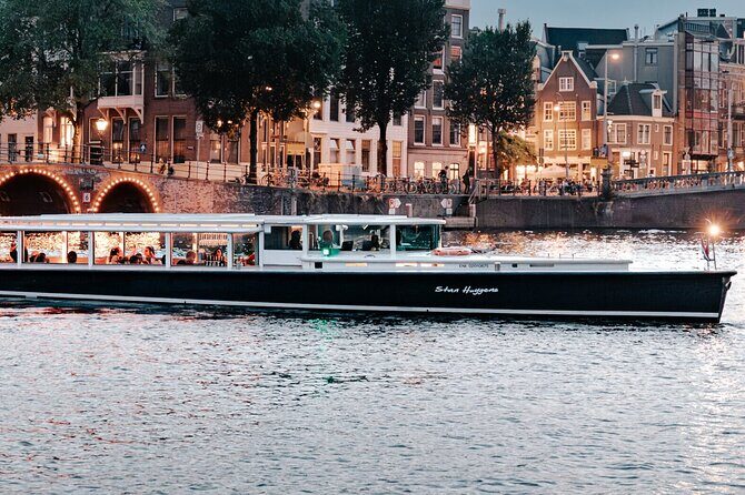 The Ultimate Amsterdam Canal Cruise - 2hr - Small Group with Drinks & Snacks - The Guides: Local Knowledge Meets Genuine Hospitality