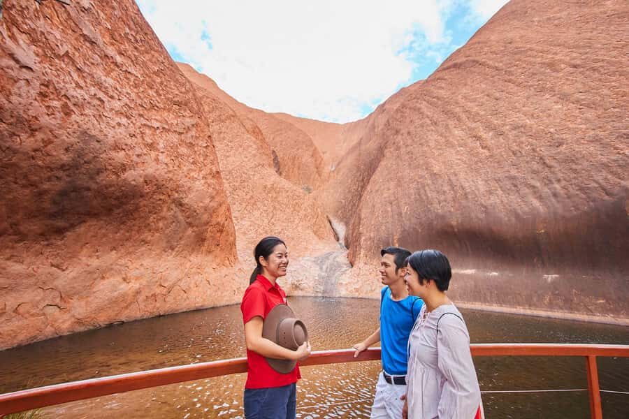 Uluru: Sacred Sites & Sunset Tour with Wine & Cheeseboard - Mutitjulu Waterhole and Rock Art