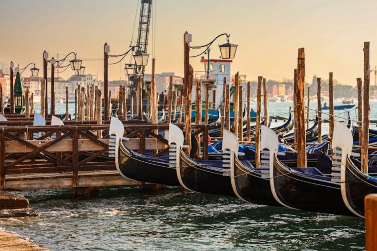 Gondolas moored at sunrise in Venice