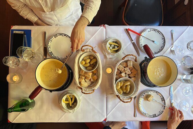 Zurich Food Tour with 10 Local Delicacies, Cheeses & Chocolates - Stop 1 on Limmatquai: classic Swiss breakfast plus street-food style bites