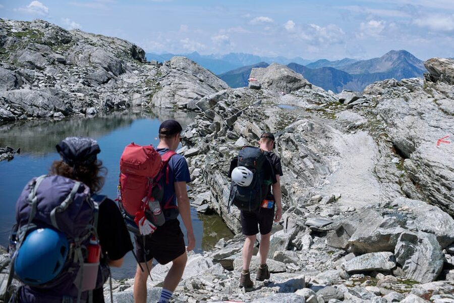 Hikers on rocky alpine paths