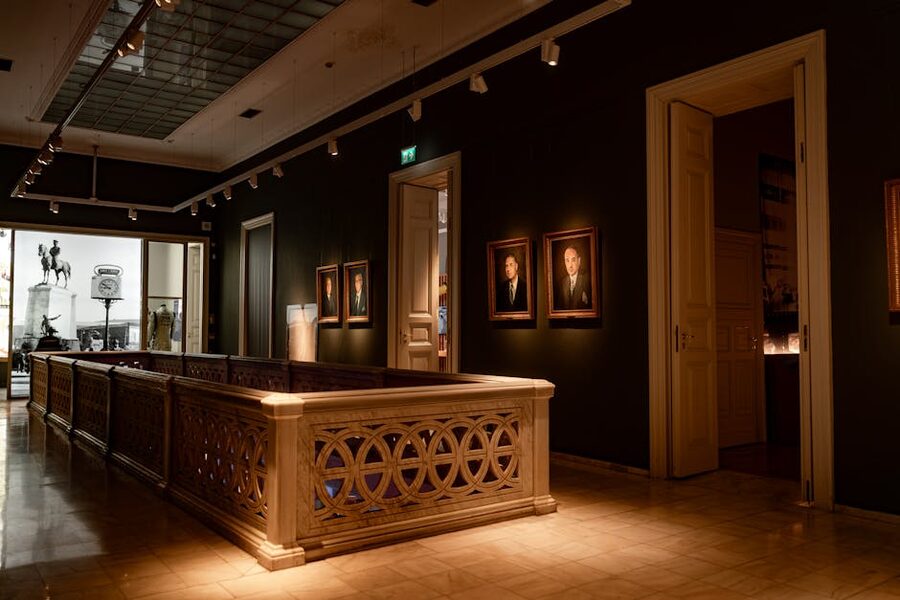 Art gallery with classic portraits and sculptures