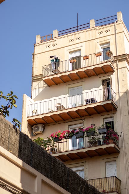 Barcelona building balcony decorated with flowers