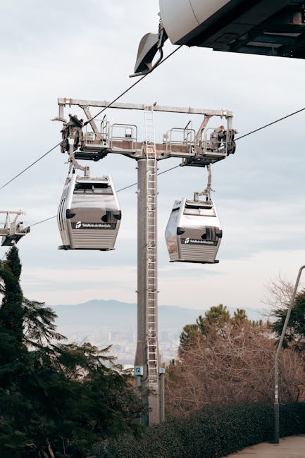 Cable car above Barcelona with city and sea views