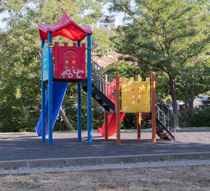 Children playing in a park playground in Barcelona