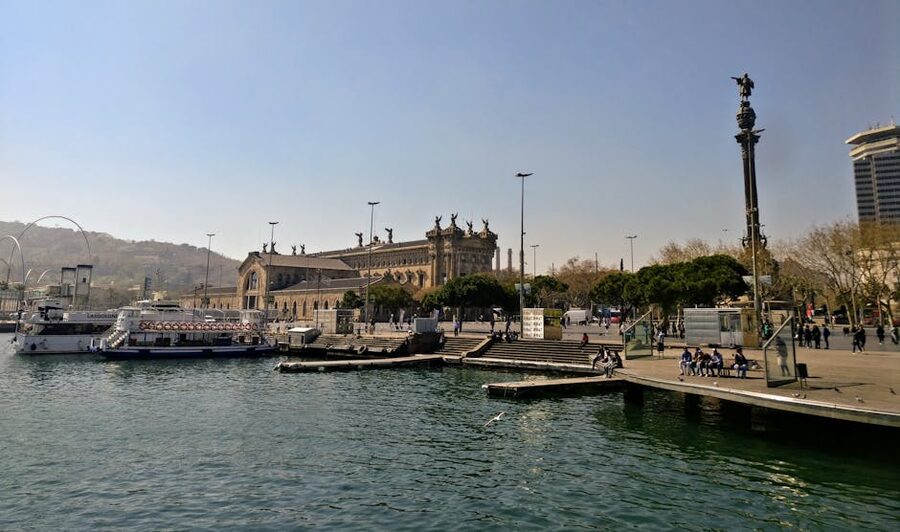 Port Vell harbour in Barcelona with boats and buildings