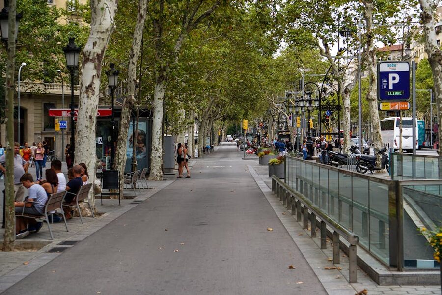 People walking along La Rambla pedestrian street in Barcelona