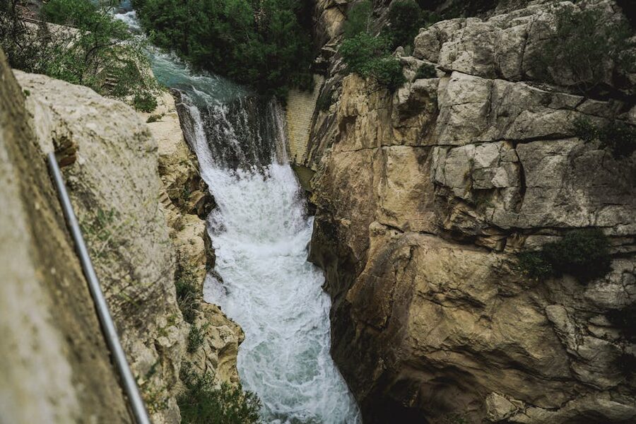 Waterfall cascading through cliffs Caminito del Rey