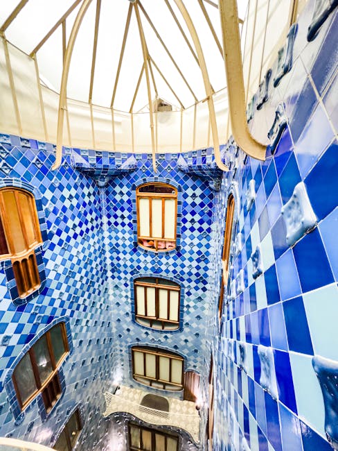 Blue tiled light well inside Casa Batllo with gradient colours