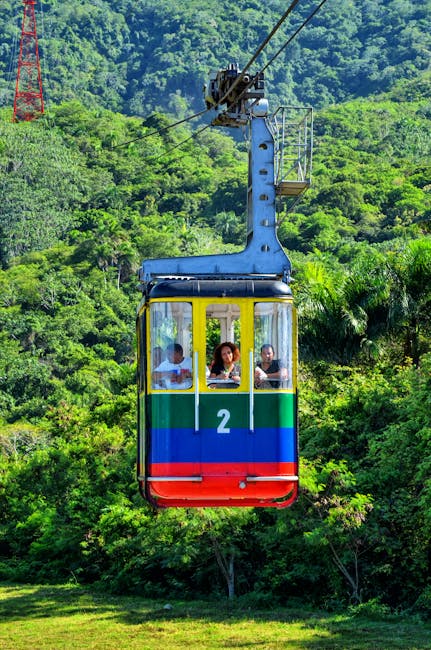 Children looking out of cable car window during ride