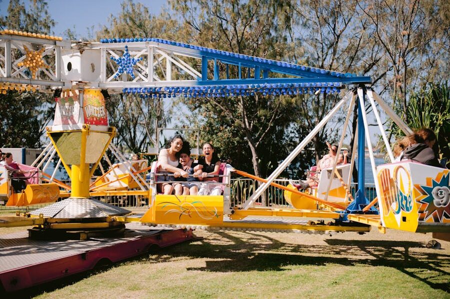 Families on carousel amusement park ride