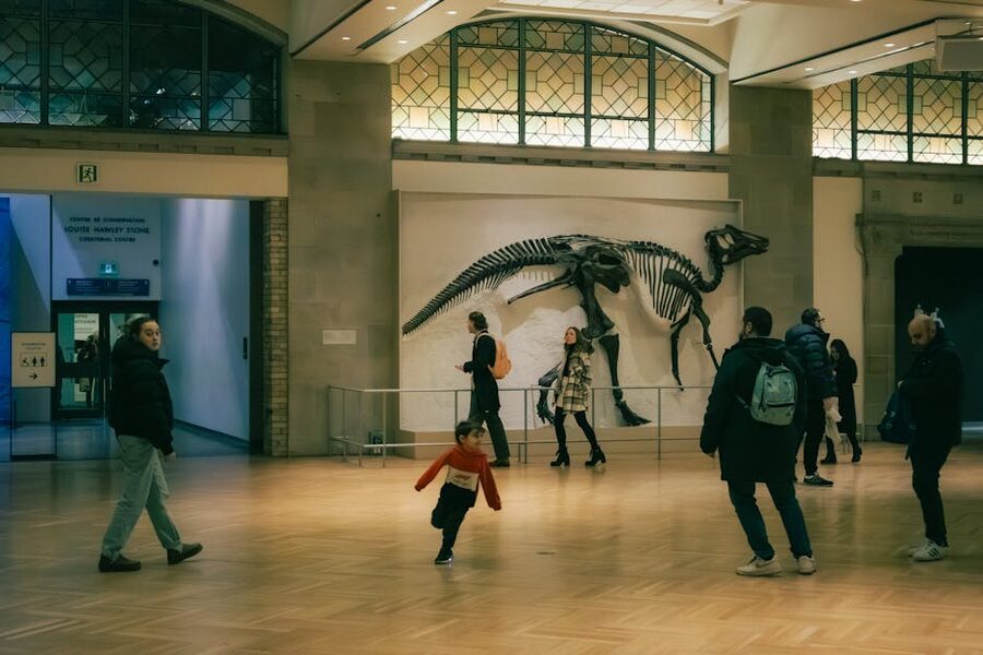Family with children walking through a museum exhibition