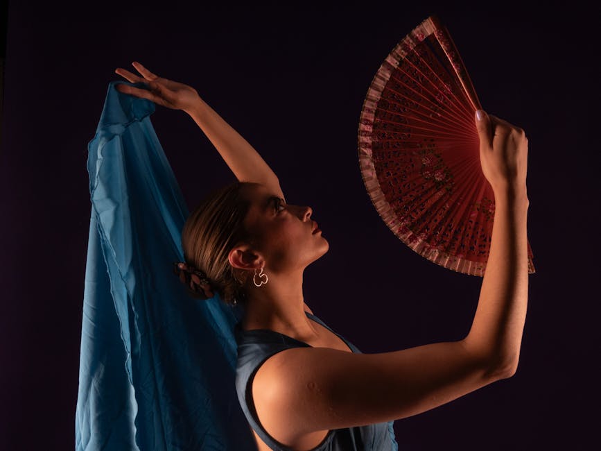 Flamenco dancer with traditional fan
