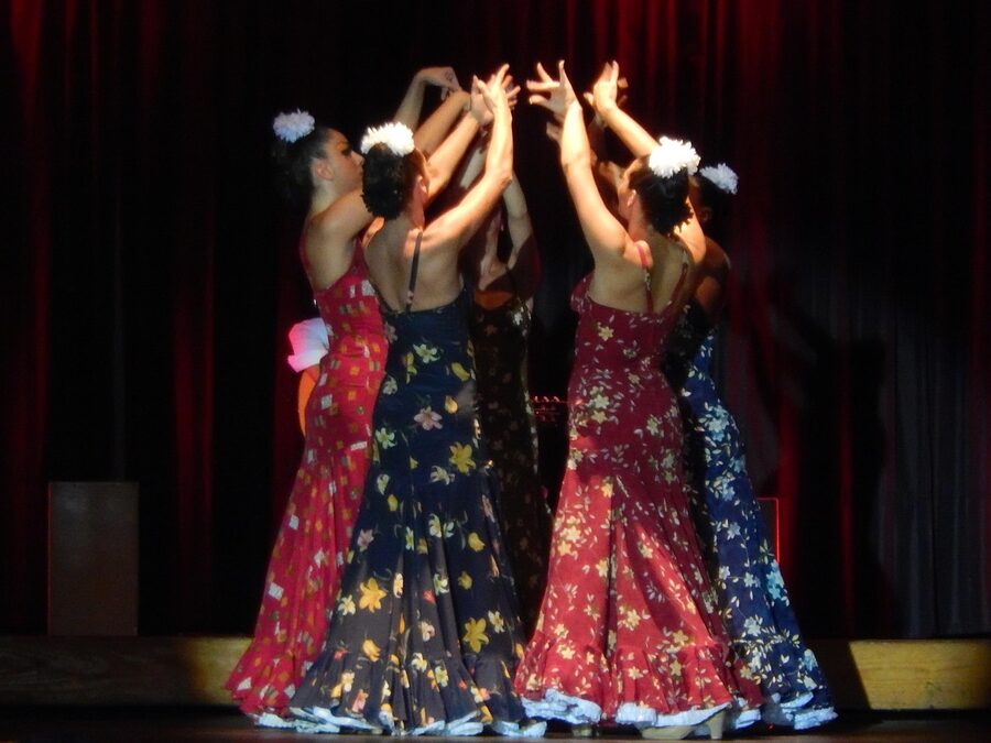 Flamenco dancers in traditional dresses