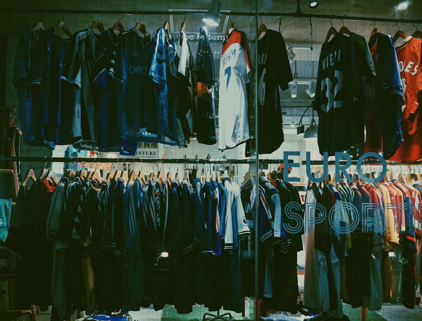 Football jerseys displayed in a museum exhibit