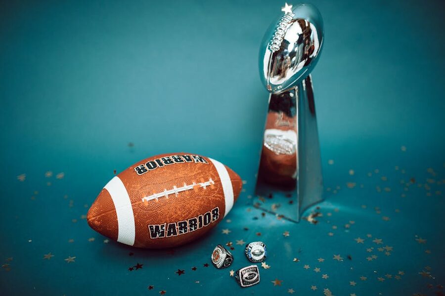 Trophy and medals displayed in a glass case in a football museum