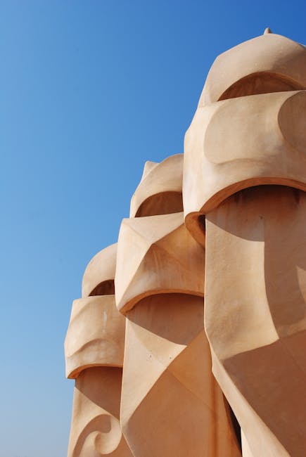 Close-up of Gaudi warrior chimney sculpture on Barcelona rooftop