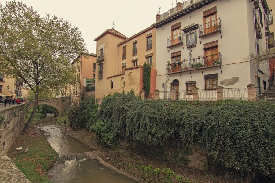 Historic buildings along river in Granada