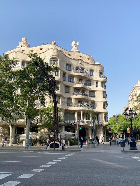 La Pedrera building illuminated at night in Barcelona