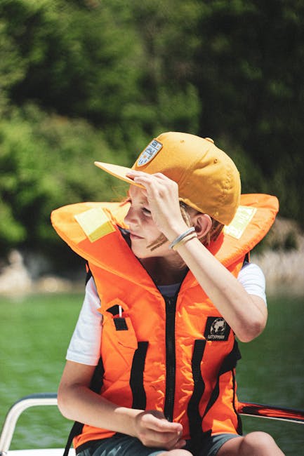 Child wearing life jacket for boat safety