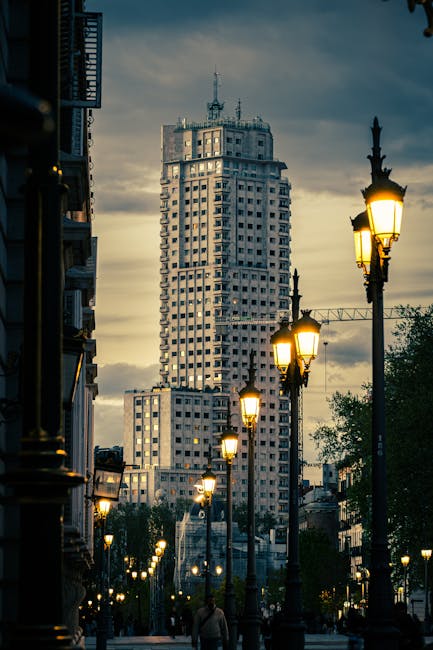 Paseo de la Castellana avenue in Madrid with modern buildings