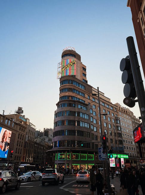 Busy Gran Via street in Madrid with historic buildings
