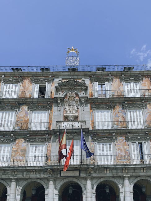 Historic Plaza Mayor square in Madrid with arcaded buildings