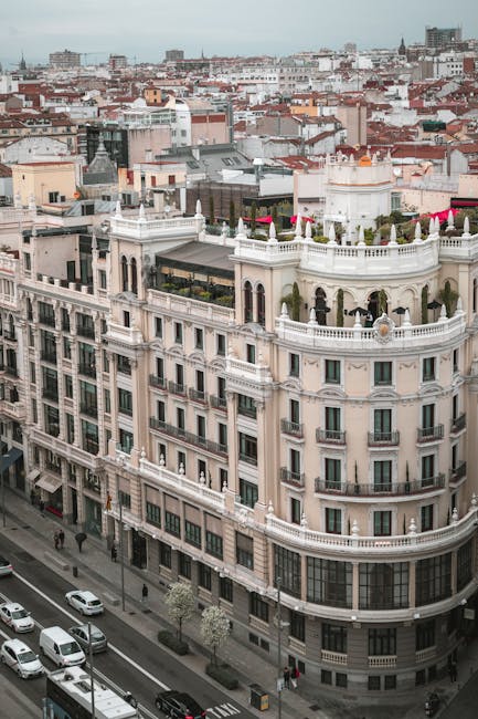 Panoramic city view from a rooftop terrace in Madrid