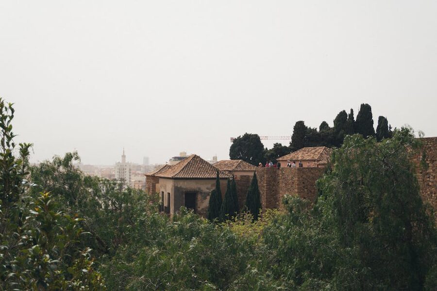 Historic stone walls and rooftops Malaga