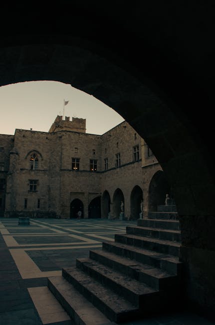 Stone arched courtyard inside a medieval palace