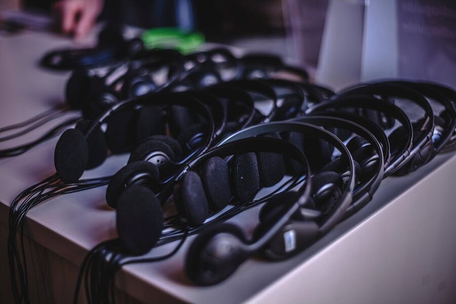 Museum audioguide device with headphones for visitors