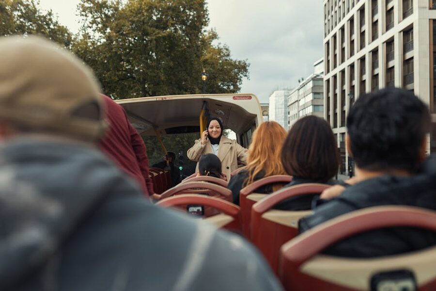 Diverse group on open-top tour bus