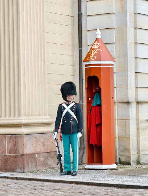 Guard ceremony in a palace courtyard with columns