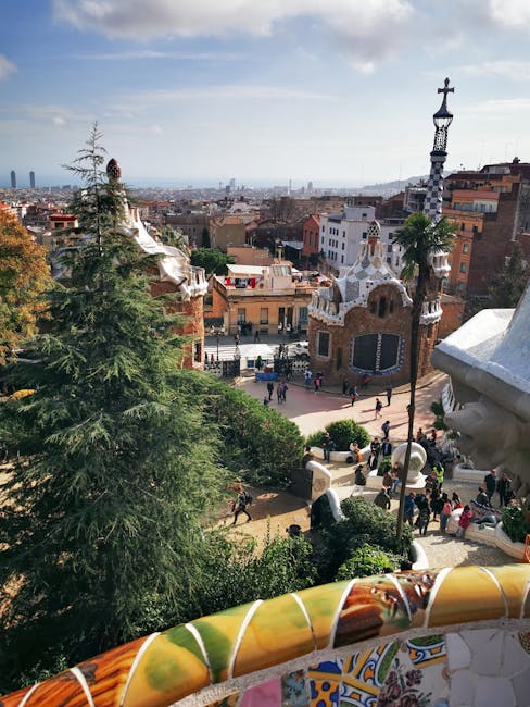 Grand stairway at the entrance of Park Guell with mosaic dragon