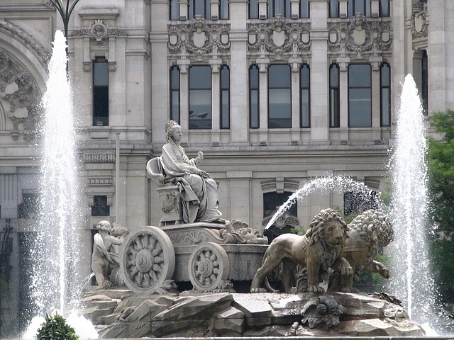 Cibeles Fountain with horse-drawn chariot sculpture in Madrid
