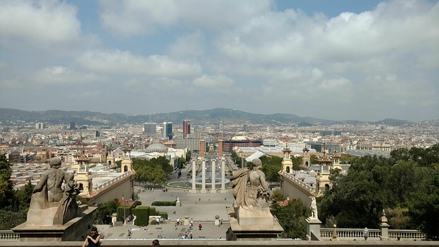 Sunny day view from Montjuic hill over Barcelona landscape