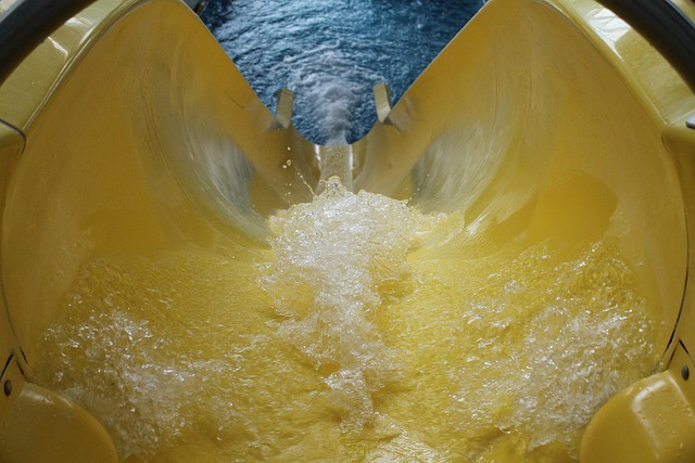 Water park slide with splashing water