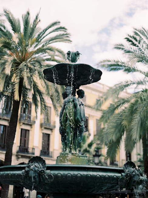 Stone fountain in an old town plaza square