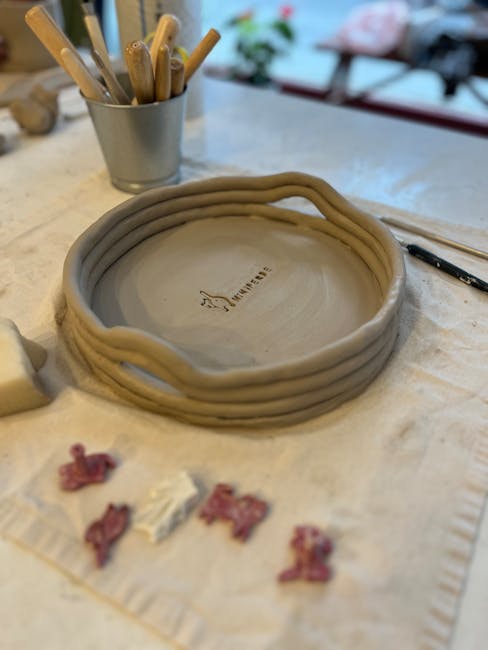 Ceramic plate with animal design painted on it