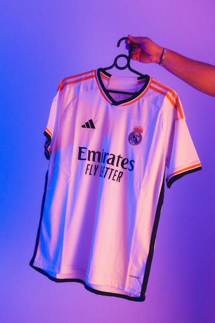 Real Madrid white football jersey on display