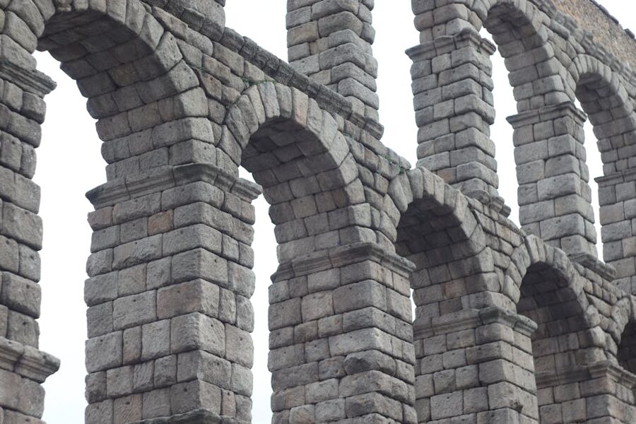 Ancient stone arches of a Roman aqueduct