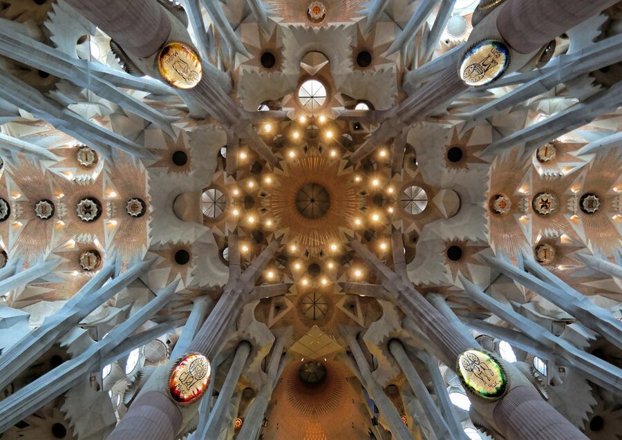 Intricate ceiling detail showing Gaudi geometric patterns inside Sagrada Familia
