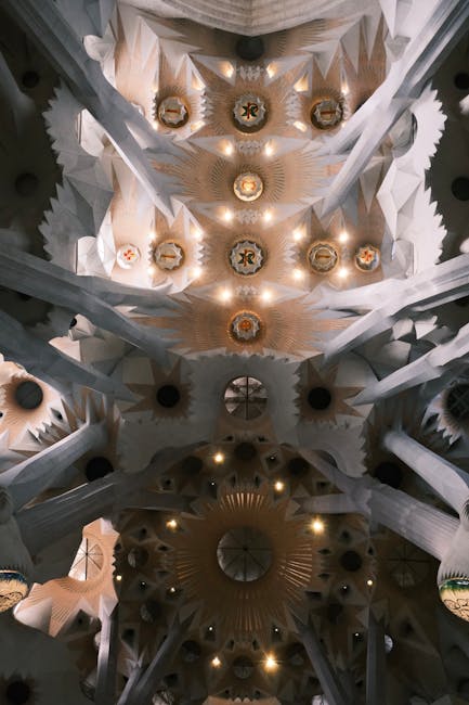 Rays of light streaming through Sagrada Familia ceiling