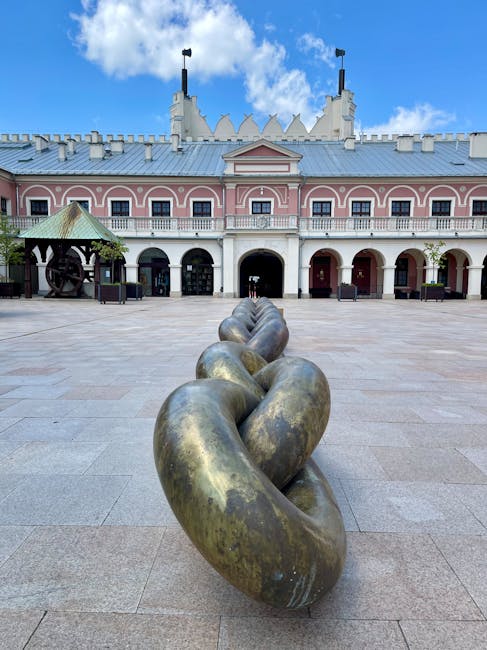 Modern sculpture displayed in a museum courtyard
