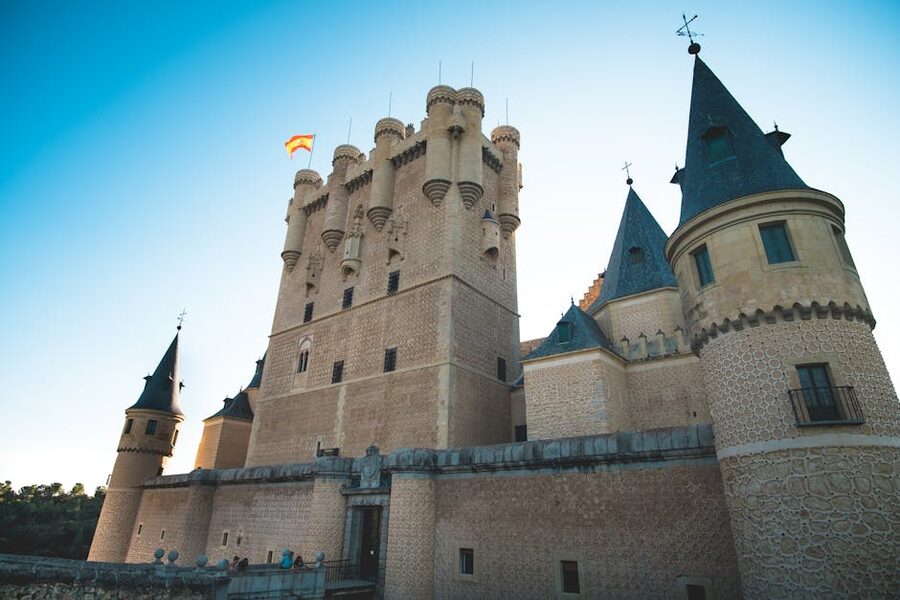 Fairy tale Alcazar castle of Segovia rising from rocky promontory